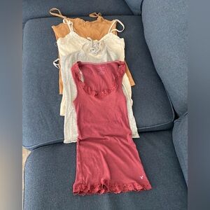 American Eagle Tops. Lot of 4. Size S/P. All but maroon have shelf bra.